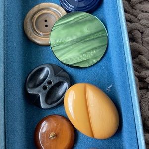 Eleven Great Big Buttons